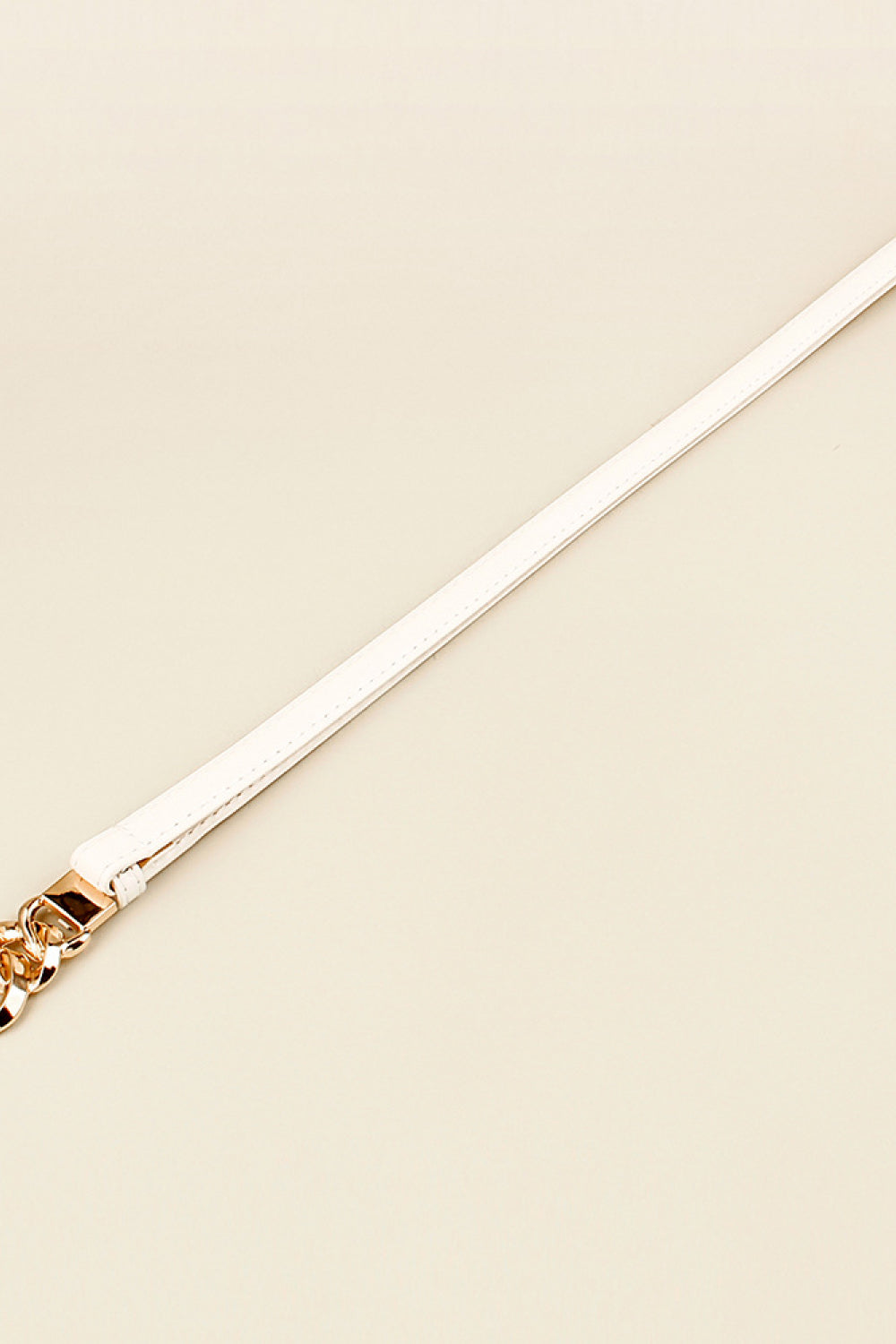 White PU skinny belt with gold chain detail on square clasp end