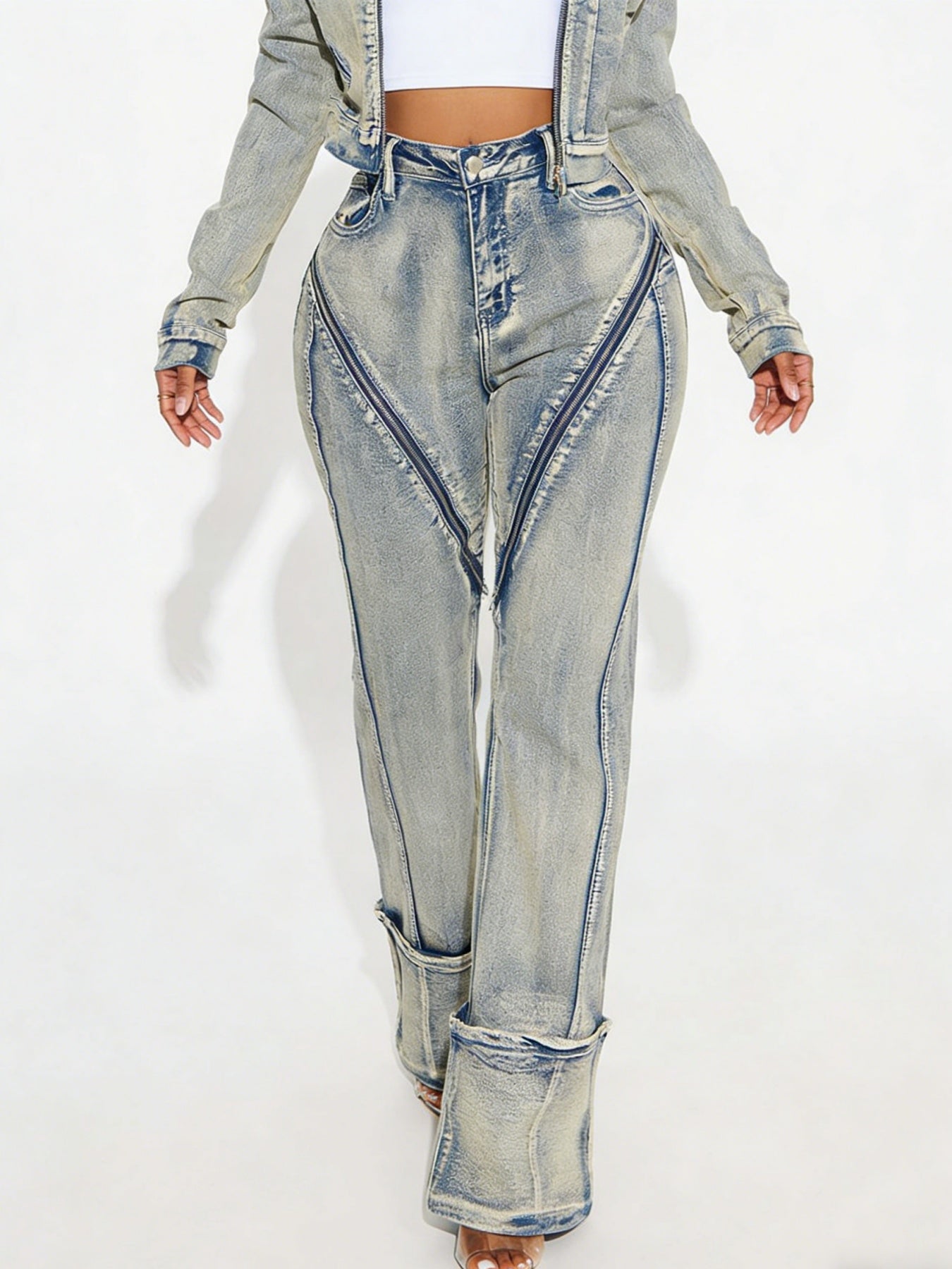 Washed denim pants in light blue with bold contrast seaming and cuffed cuffs