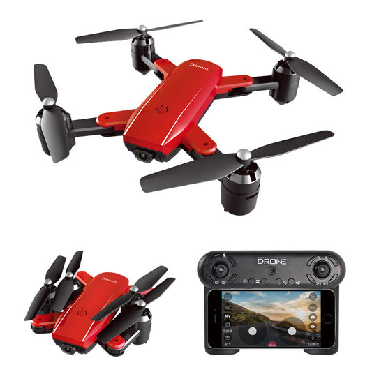 Red folding quadcopter drone with four propellers and handheld remote controller screen