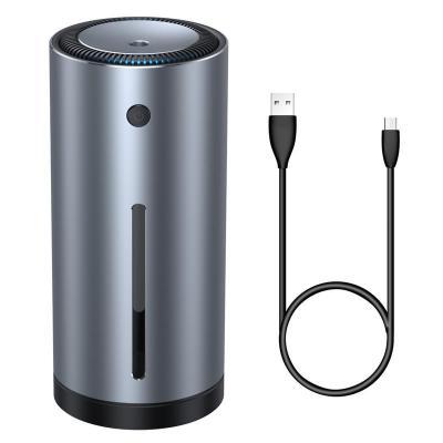 Gray cylindrical humidifier with USB cable on a white background