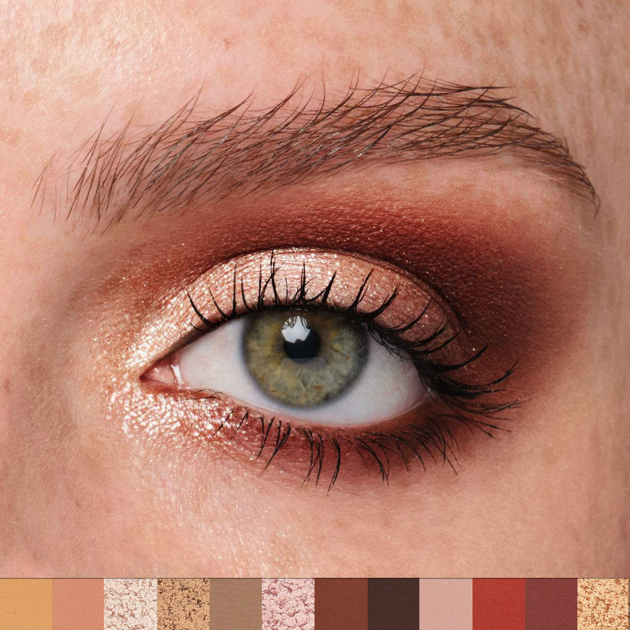 Close-up of a person's eye with bronze eyeshadow and a color swatch below.