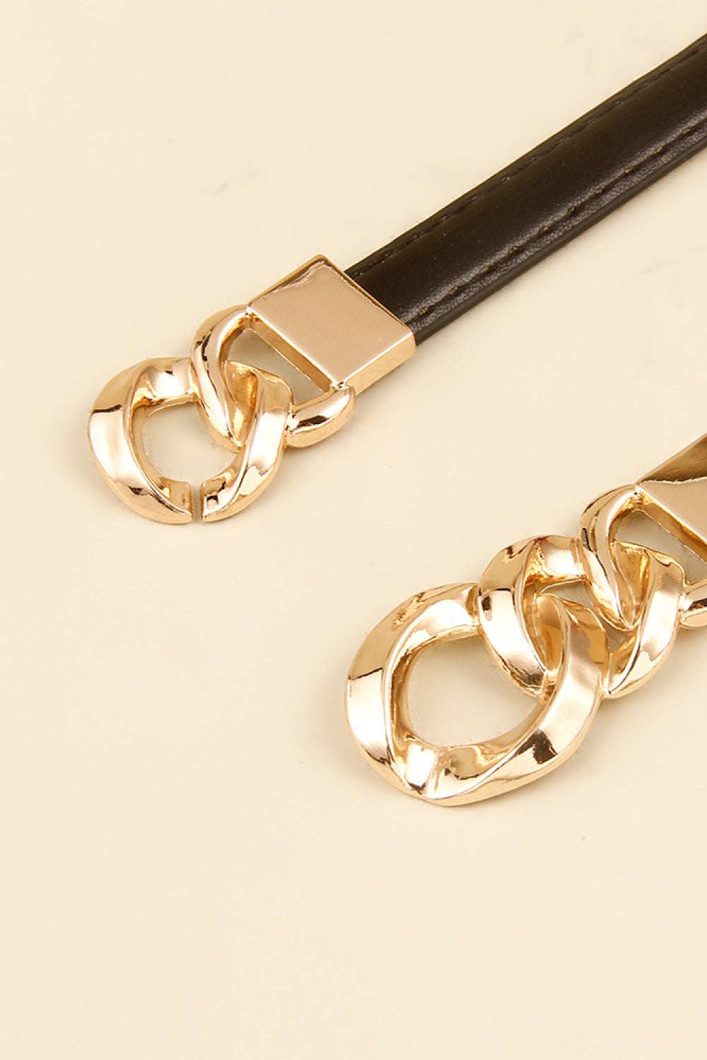 Dark brown PU skinny belt with gold chain buckle and square clasp close-up