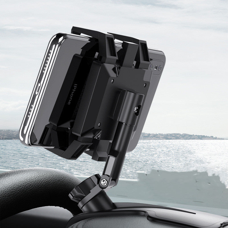 Car phone holder mounted on a car dashboard with a scenic background