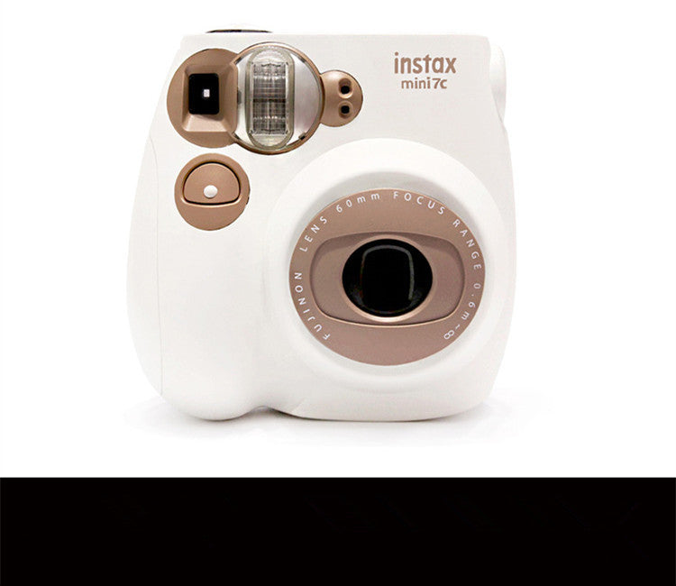 White and rose gold instant camera with 'instax' branding on a white background