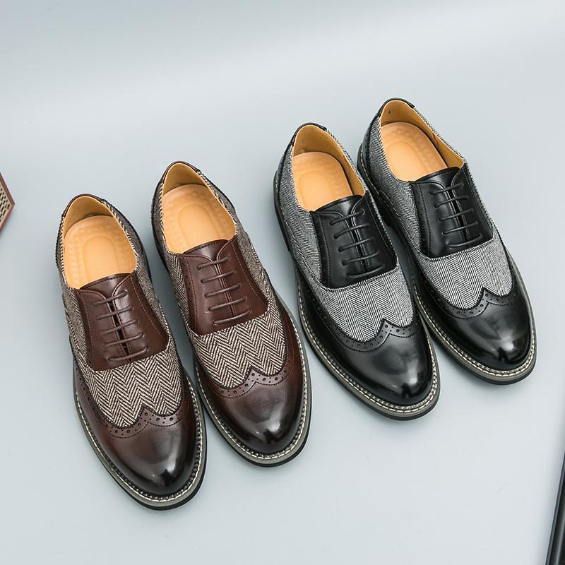 Two pairs of men's dress shoes on a light gray background
