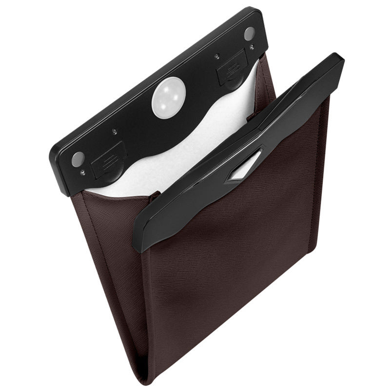 Brown leather pouch with black interior lining on a white background