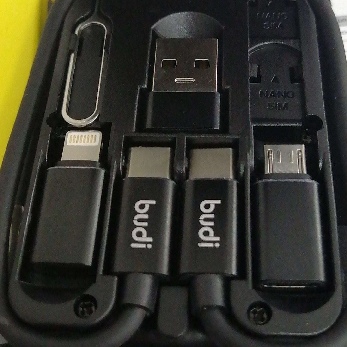 Close-up of black charging dock ports with USB and Lightning connectors