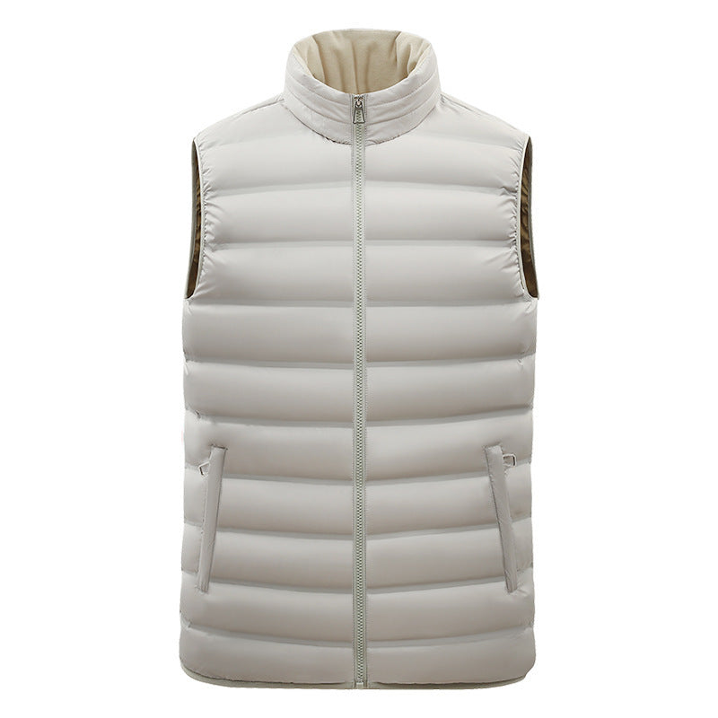 White puffer vest with a zipper on a white background