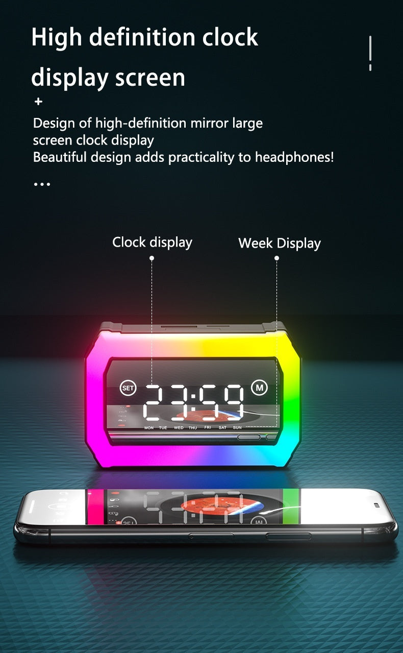 Colorful clock display with digital time and week display on a dark background