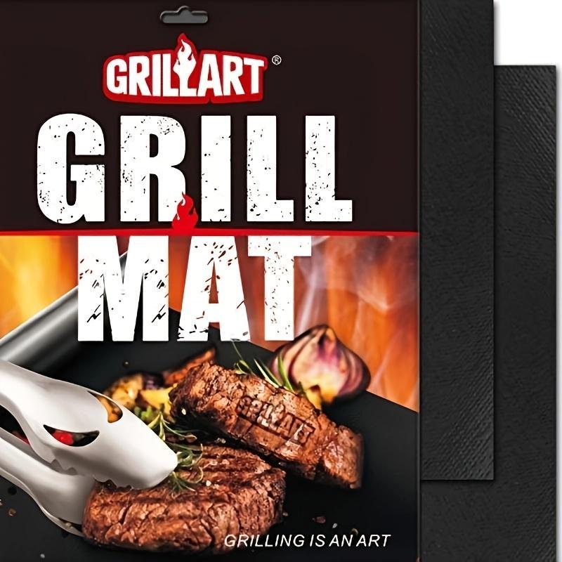 Grillart grill mat packaging with grilled meat and tongs on a dark background