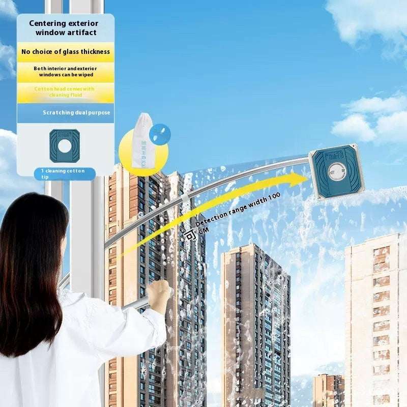 Person cleaning a window with a tool against a blue sky background