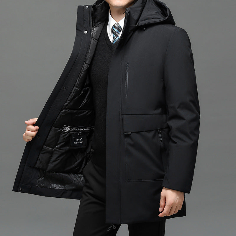 Black coat with a hood worn by a person on a gray background
