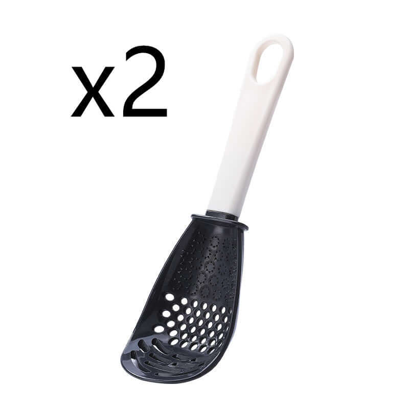 Perforated black cooking spoon with white handle