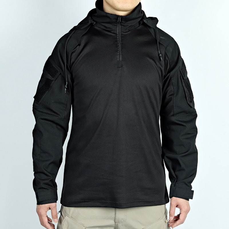 Black tactical hoodie worn by a person on a light gray background
