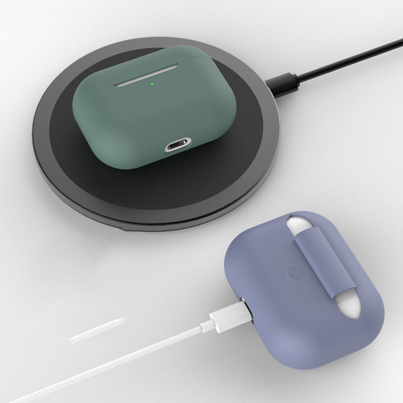 Green wireless charging case on a black charging pad
