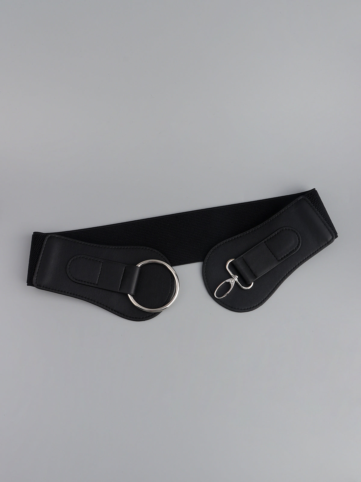 Black wide elastic belt laid flat with two ring loops and silver hardware