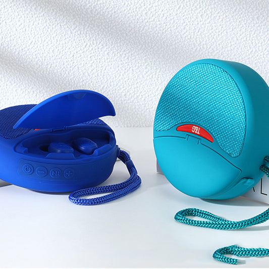 Blue and turquoise portable speaker with charging case on a white background