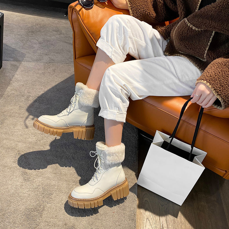 Women’s beige lace-up winter boots with fluffy cuffs and thick tread sole