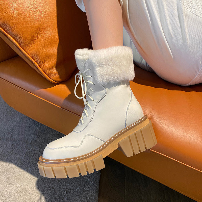 Women’s white lace-up snow boots with faux-fur cuff and block heel platform sole