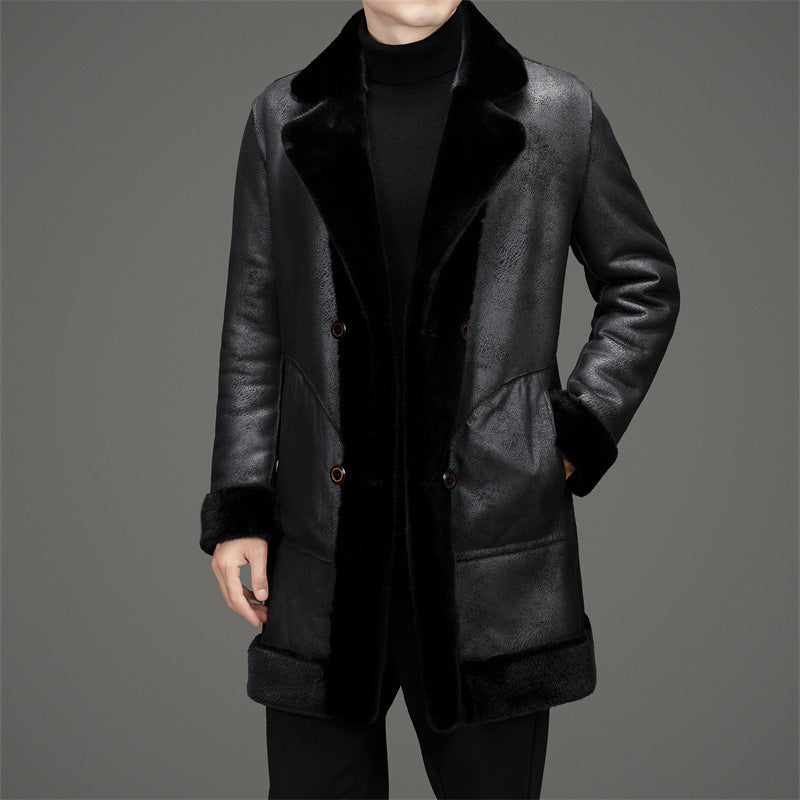 Black reversible mink coat with notch collar, button front, and side pockets