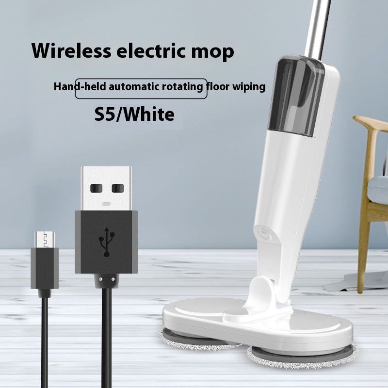 Wireless electric mop with USB cable on a light wooden floor.