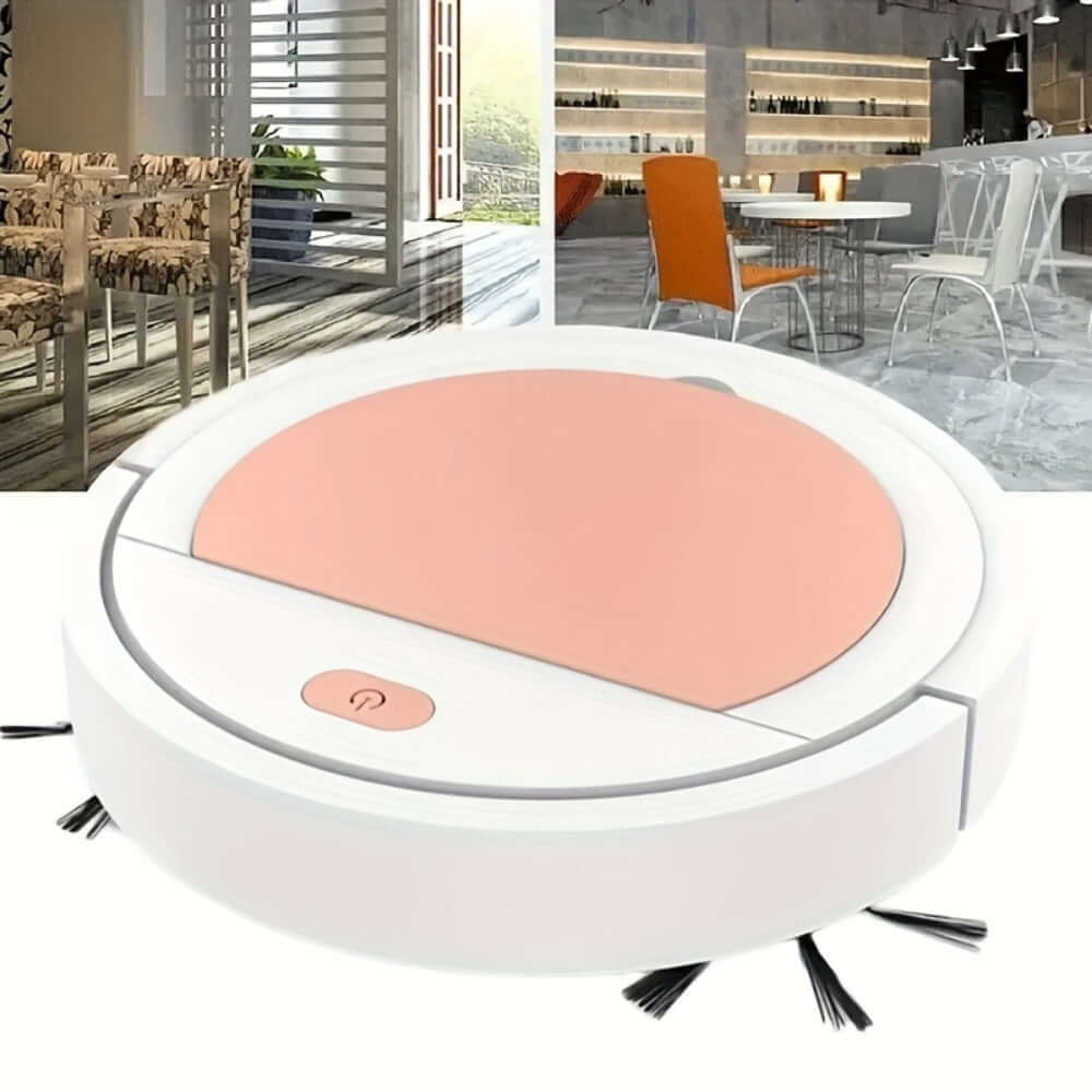 White robotic vacuum with pink top panel and side brushes, in an indoor room scene.