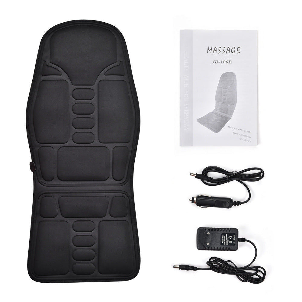 Black massage chair pad with power adapter and user manual on a white background