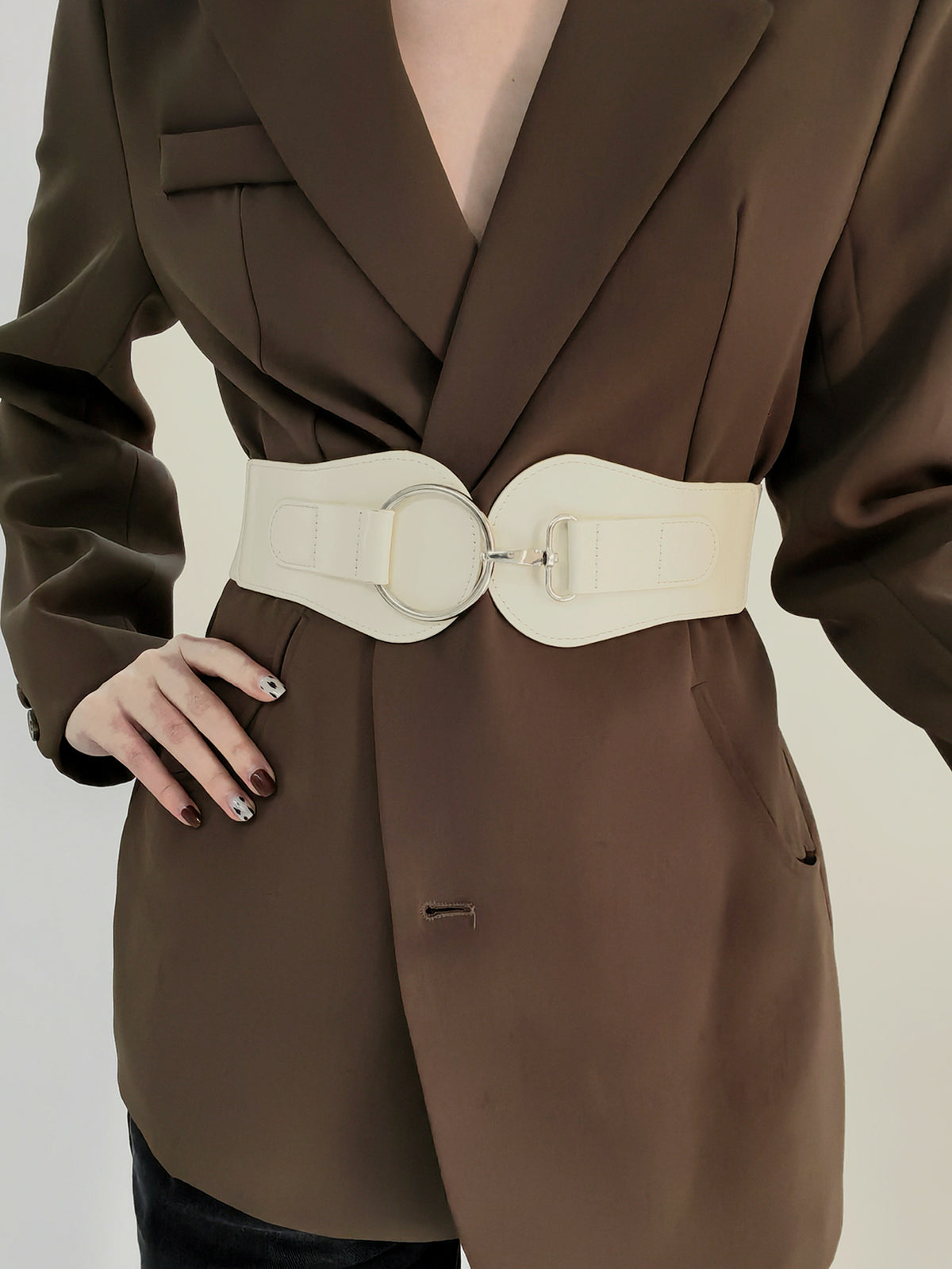 PU elastic wide belt in cream with oval ring buckle and stitched strap ends