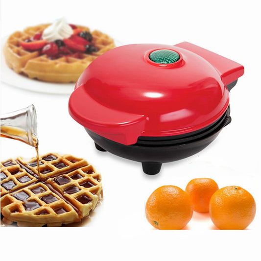 A red electric waffle maker with a EU plug, alongside images of bubble-shaped waffles and oranges.