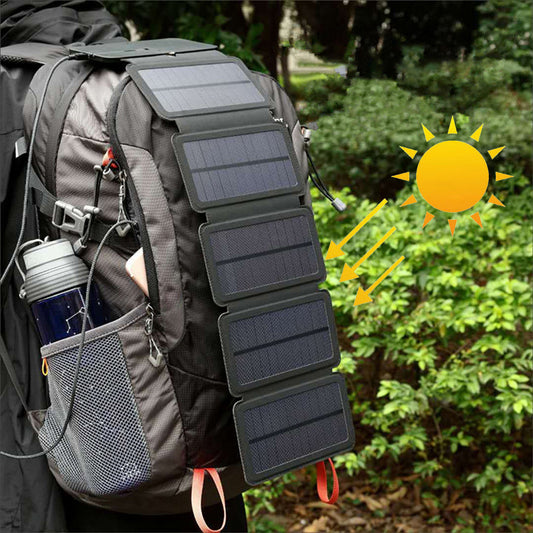 Foldable solar panel charger on a gray backpack with stacked dark panels