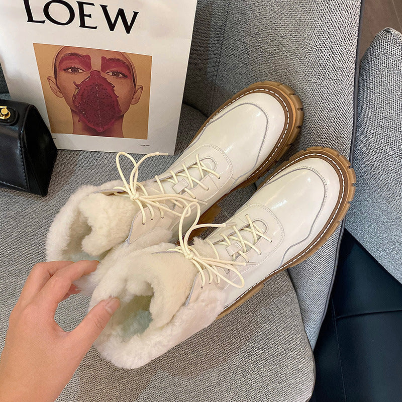 Women’s cream lace-up snow boots with faux-fur lining and chunky rubber sole
