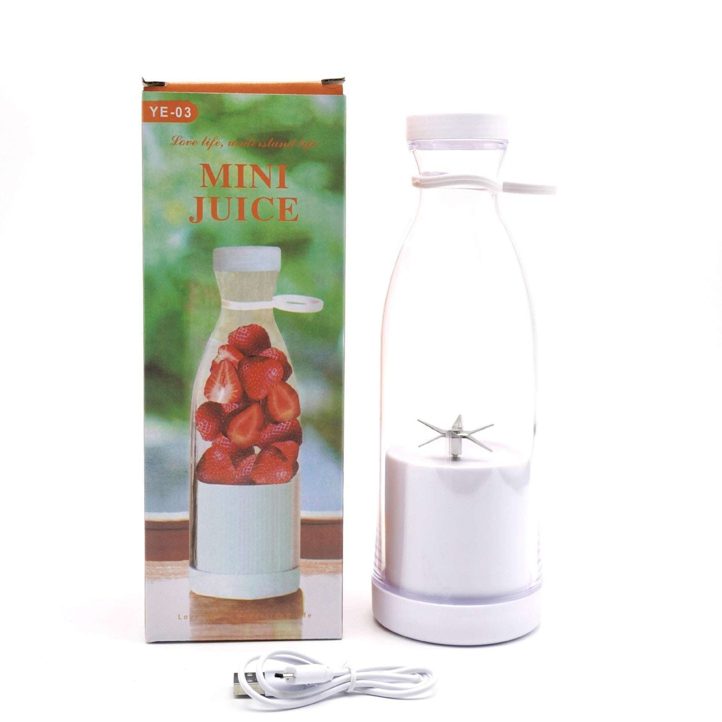 White mini juice maker with packaging featuring strawberries on a white background