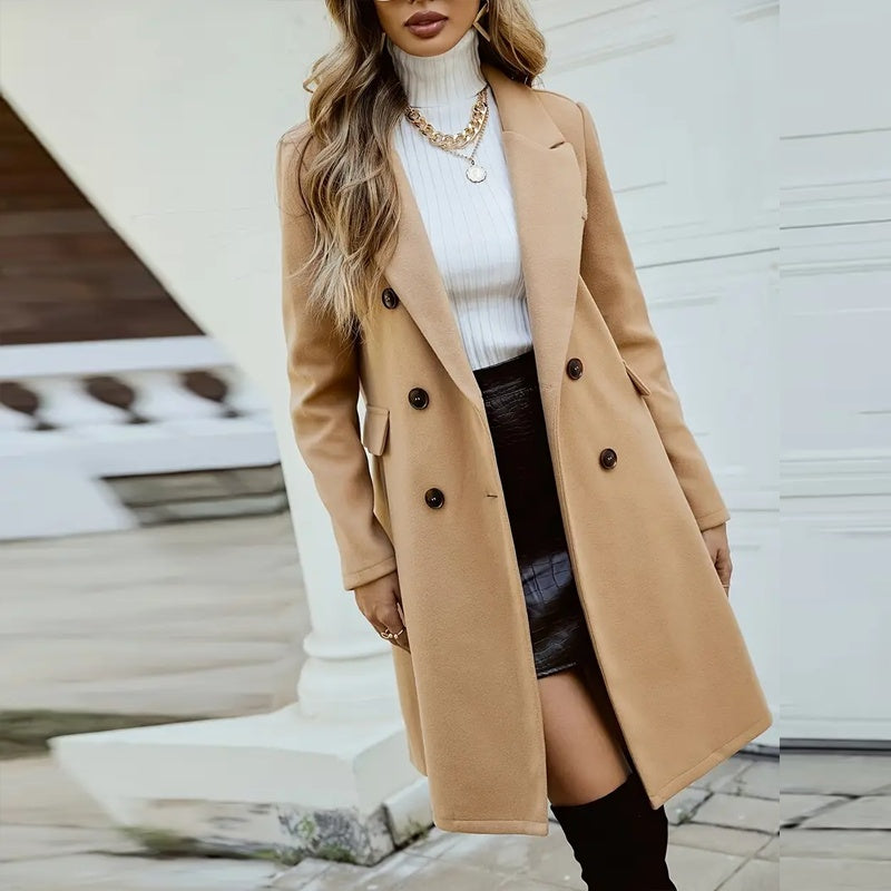 Tan mid-length double-breasted coat with notched lapels and dark buttons