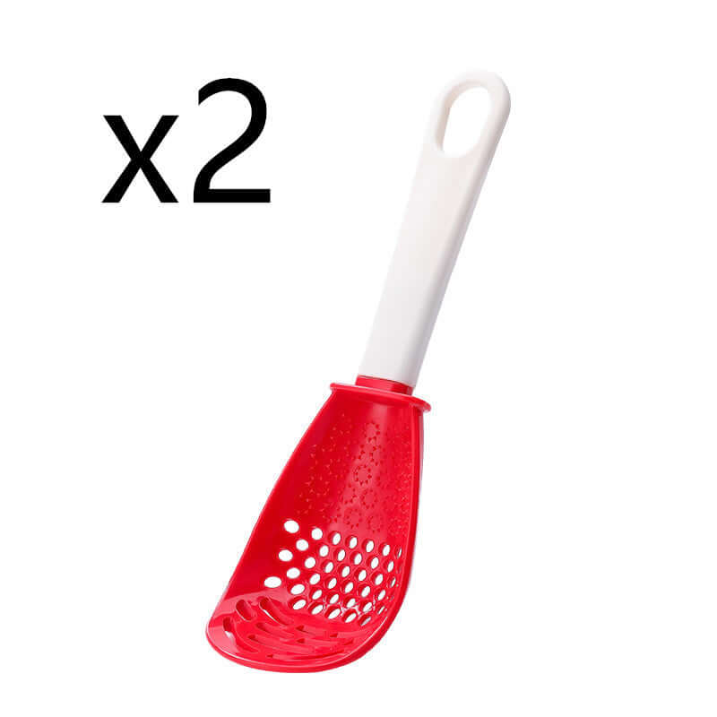 Perforated red cooking spoon with white handle