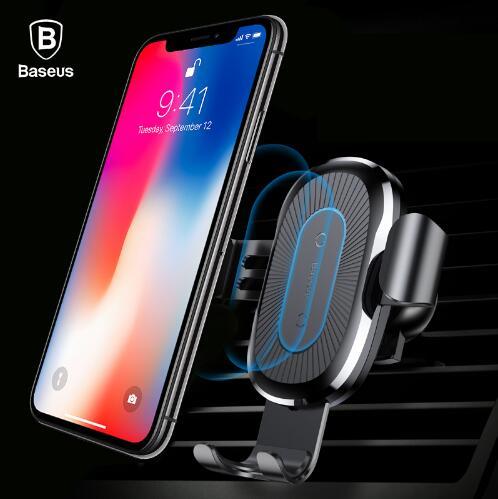 Phone holder with smartphone displaying time and date, Baseus logo visible
