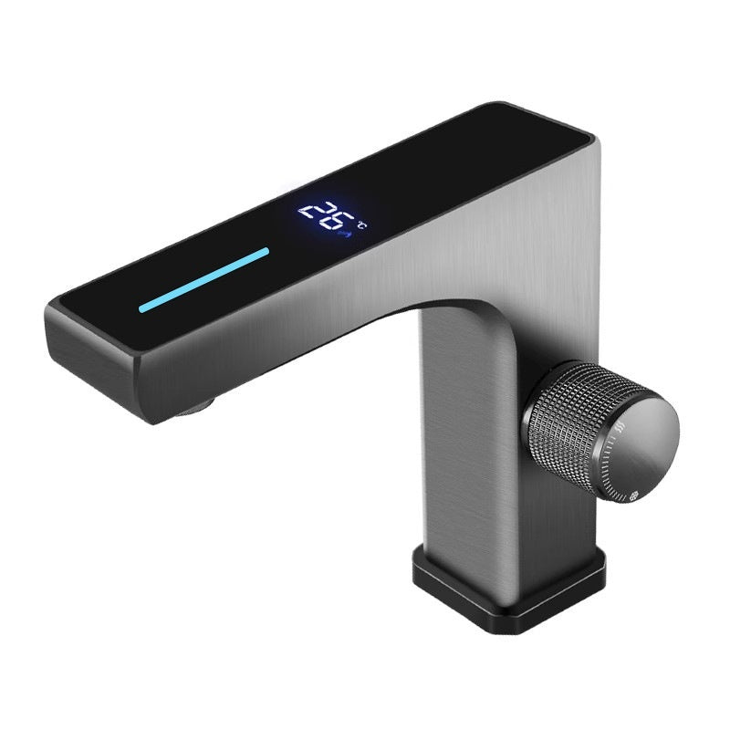 Modern faucet with digital display on a white background