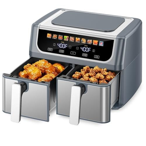 Gray dual-zone air fryer with two baskets holding chicken pieces and fried snacks