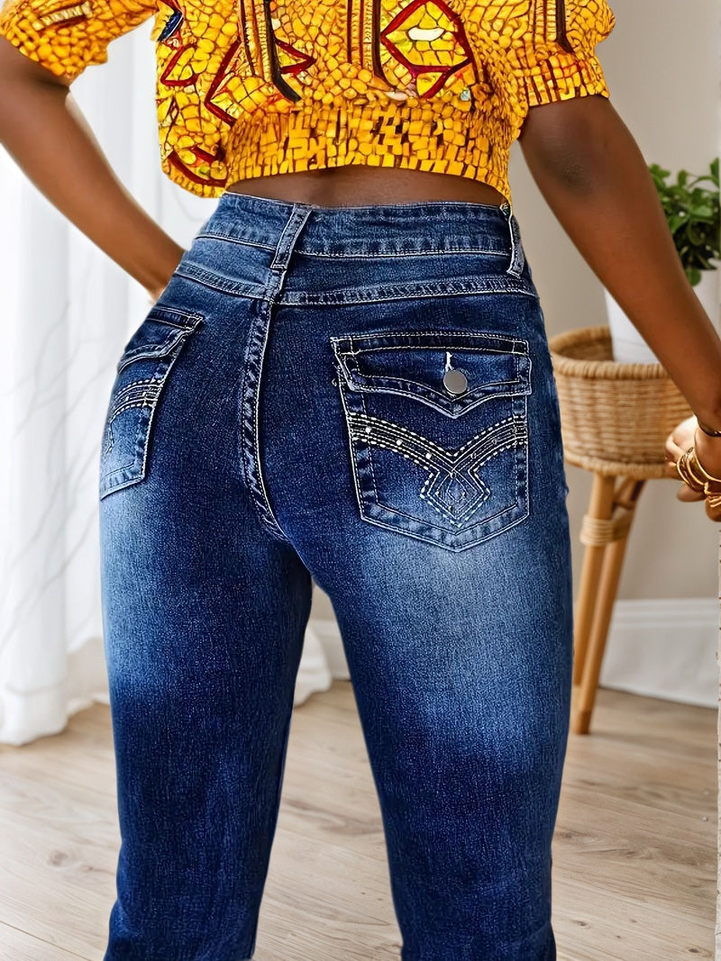 Slim-fit washed blue jeans close-up of back pockets and waist stitching
