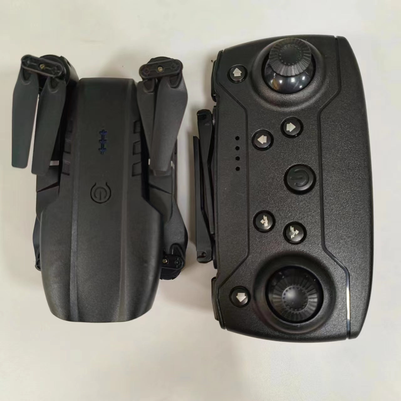 The Battery Configuration Of The E99 Smart Camera Drone Features Real-time Image Transmission From A Single Camera. It Has One-click Touch And Landing Functions. This Is A Foldable Remote-controlled D