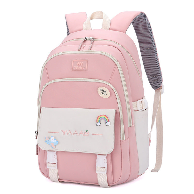 Pink school backpack with white trim, front pouch with rainbow patch, padded shoulder straps