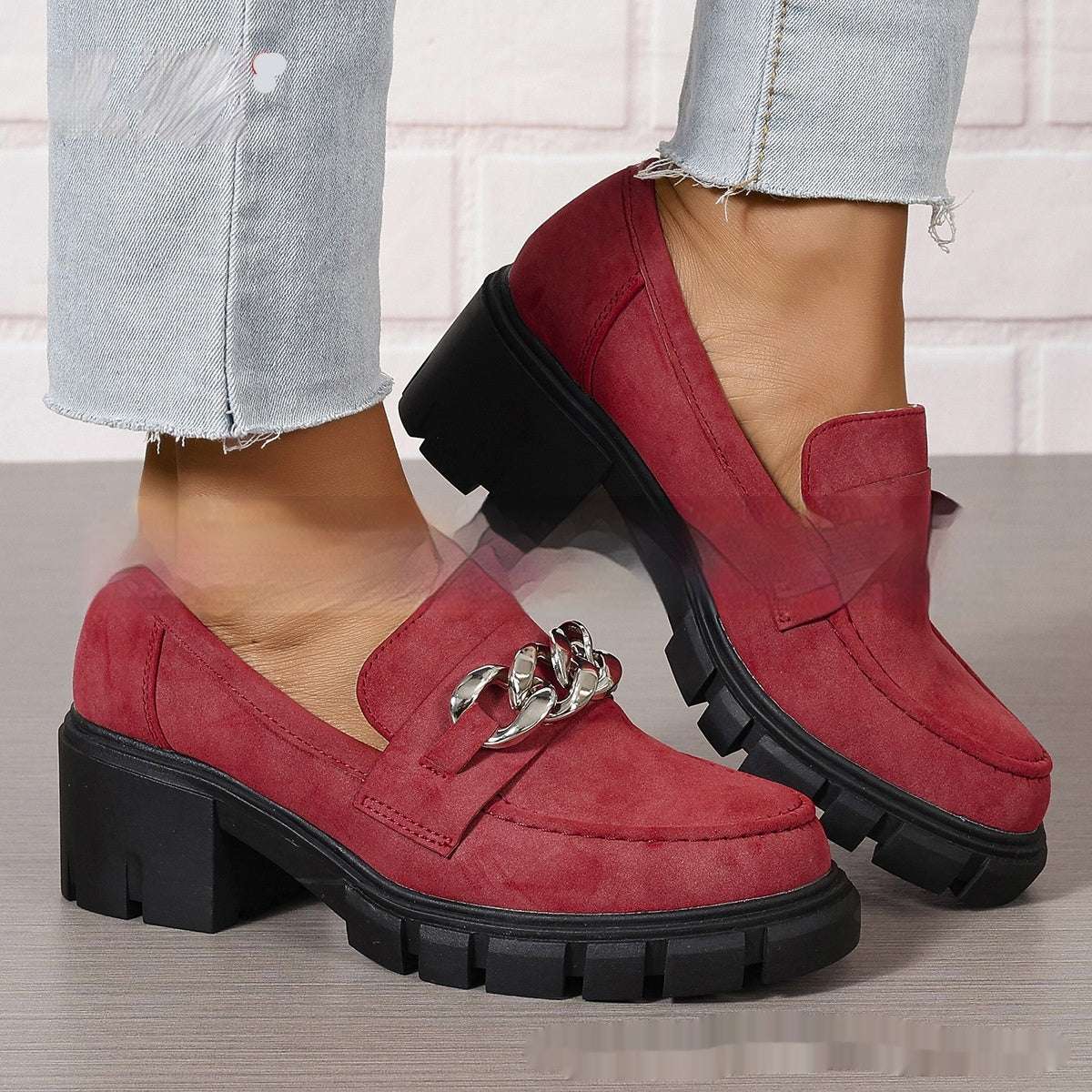 Red chunky heel loafers with silver chain detail and block heel with tread sole