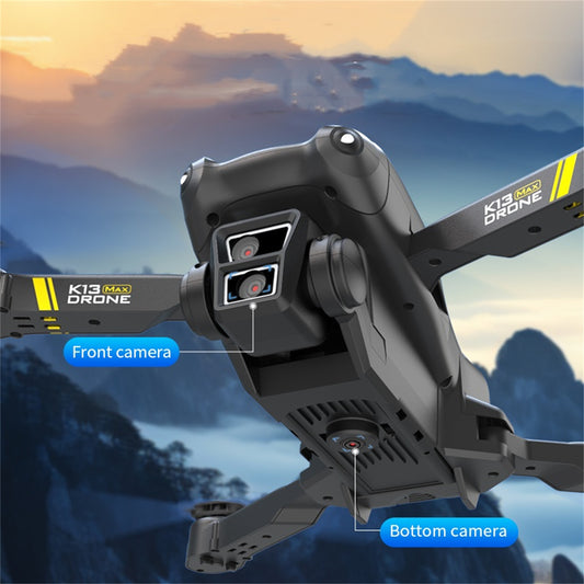 TheK13 Smart Camera Drone With 2 Batteries Features Real-time Image Transmission From A Single Camera. It Has One-click Touch And Landing Functions. This Is A Foldable Remote-controlled Drone Toy, Ma