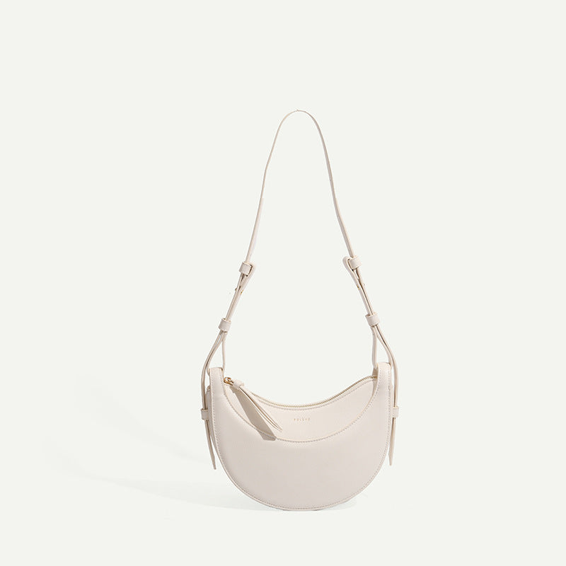A brown genuine leather shoulder bag