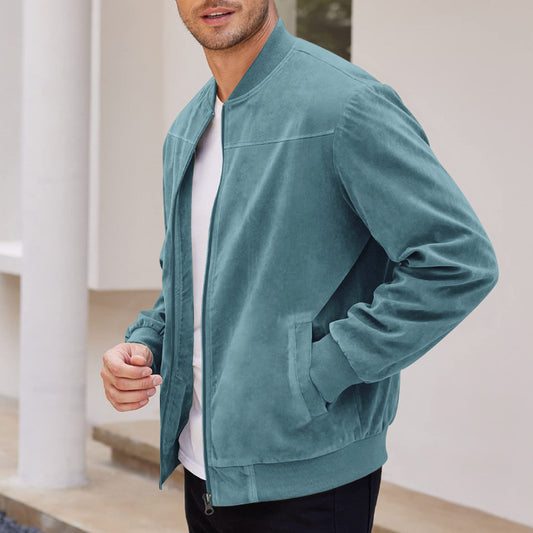A man wearing a classic tan suede retro jacket with a shirt collar and button-front closure, styled for a sophisticated casual autumn look.