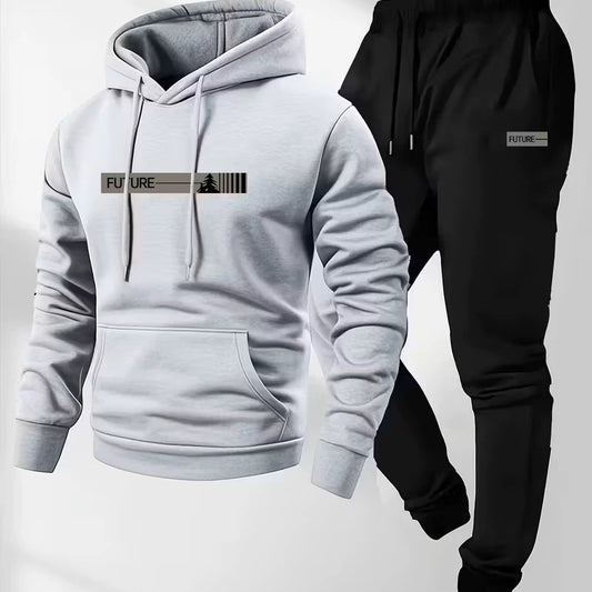 A woman wearing a matching loose-fit hoodie jacket and wide-leg lounge pants in a soft-touch fabric, styled for a cozy and fashionable athleisure look.