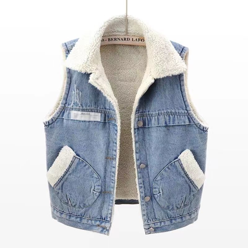 Denim vest with white sherpa lining on a white background