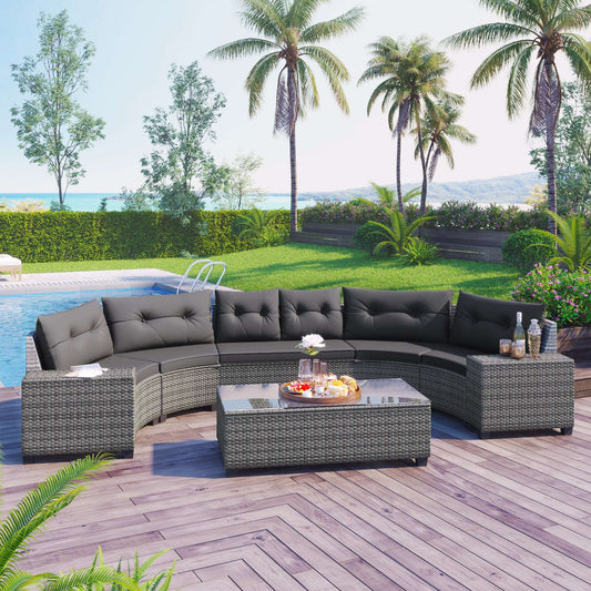 Gray 8-piece outdoor wicker round sofa set with half-moon sectional seating, cushions, and a rectangular coffee table on a patio.