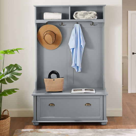 Gray entryway hall tree featuring a built-in shoe bench, storage cabinets, and multiple coat hooks for organized home storage.