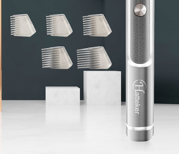 Hair trimmer with interchangeable combs on a white surface and dark gray background