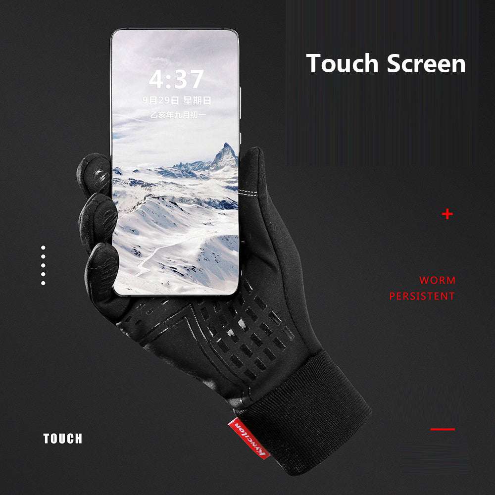 Black touchscreen glove holding a smartphone with a snowy mountain display on a dark background.